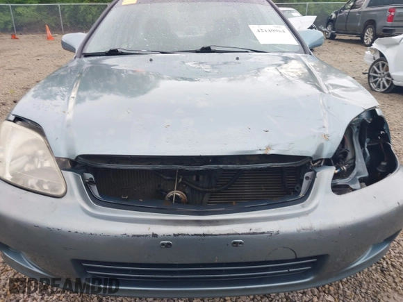 2000 Honda Civic EX z VIN 1HGEJ8644YL006150, wystawiony jako IAAI lot #42149964 z przebiegiem 195 489 mil mil oraz . Historia ofert i sprzedaży dostępna na DreamBid. Obrazek 18.