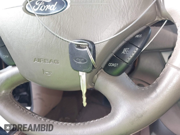 2004 Ford Focus ZTW with VIN 1FAFP35Z64W173237, listed as a IAAI auction lot 42685899 with 209,690 mi miles and . Bid and sale history available at DreamBid. Image 11.