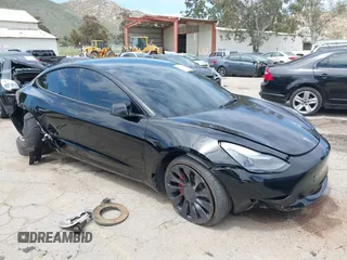 2023 Tesla Model 3 Performance z VIN 5YJ3E1EC0PF595628, wystawiony jako IAAI lot #39227371 z przebiegiem Nie podano mil oraz . Historia ofert i sprzedaży dostępna na DreamBid. Obrazek 1.