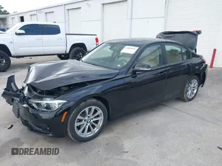 2018 BMW 3 Series 320i xDrive with VIN WBA8E5G53JNU45708, listed as a IAAI auction lot 41865092 with 88,720 mi miles. Bid and sale history available at carsss.com. Image 2.