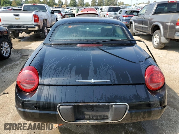2002 Ford Thunderbird Hardtop Premium z VIN 1FAHP60A22Y107619, wystawiony jako Copart lot #55755765 z przebiegiem 32 306 mil mil oraz Nie do naprawy • Non repairable. Historia ofert i sprzedaży dostępna na DreamBid. Obrazek 6.