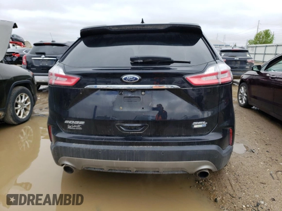 2020 Ford Edge SEL с VIN 2FMPK4J90LBA34676, выставлен на аукционе Copart как лот 55577665 с пробегом 113 214 миль миль и Списание • Salvage title. История ставок и продаж доступна на DreamBid. Изображение 6.