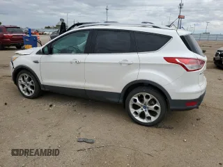 2013 Ford Escape Titanium with VIN 1FMCU0J90DUB90746, listed as a Copart auction lot 72767464 with 67,388 mi miles and Salvage Title. Bid and sale history available at carsss.com. Image 2.