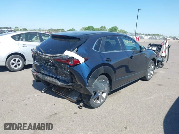 2021 Mazda CX-30 Preferred with VIN 3MVDMBCLXMM202269, listed as a IAAI auction lot 42234251 with 41,702 mi miles and . Bid and sale history available at DreamBid. Image 4.