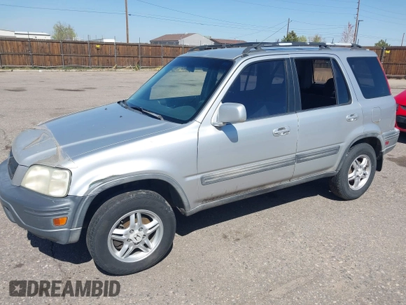 1999 Honda CR-V EX with VIN JHLRD1860XC056641, listed as a IAAI auction lot 42018329 with 321,707 mi miles. Bid and sale history available at carsss.com. Image 2.
