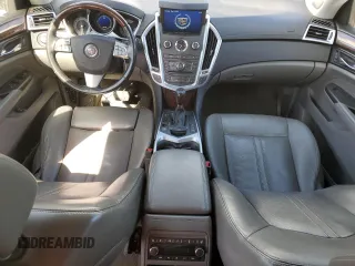 2012 Cadillac SRX Premium Collection with VIN 3GYFNFE39CS515037, listed as a Copart auction lot 55797235 with 146,778 mi miles and Salvage title. Bid and sale history available at DreamBid. Image 8.