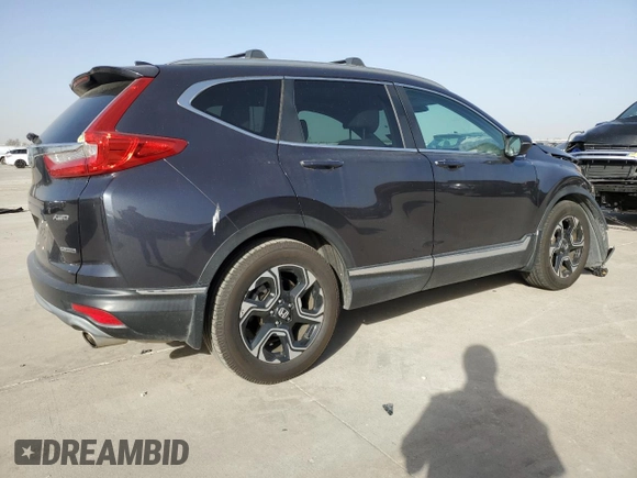 2018 Honda CR-V Touring with VIN 7FARW2H90JE043944, listed as a Copart auction lot 49346705 with 56,259 mi miles and Salvage Title. Bid and sale history available at carsss.com. Image 3.