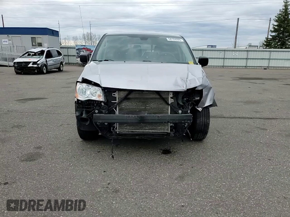2019 Dodge Grand Caravan SE with VIN 2C4RDGBGXKR642247, listed as a Copart auction lot 54124295 with 153,163 mi miles and Salvage Title. Bid and sale history available at DreamBid. Image 14.