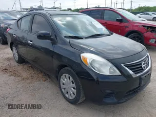 2014 Nissan Versa SV with VIN 3N1CN7AP1EL822984, listed as a IAAI auction lot 42124959 with 126,900 mi miles. Bid and sale history available at carsss.com. Image 1.
