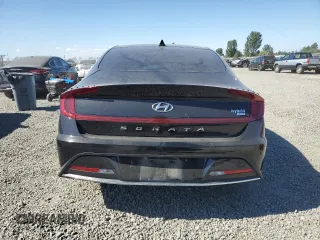 2022 Hyundai Sonata Hybrid Blue with VIN KMHL24JJ9NA052455, listed as a Copart auction lot 61164194 with 31,272 mi miles and Salvage Title. Bid and sale history available at carsss.com. Image 6.