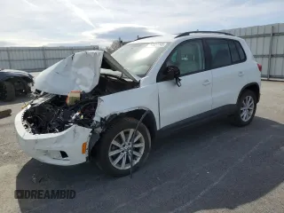 2015 Volkswagen Tiguan SE z VIN WVGBV7AXXFW552542, wystawiony jako Copart lot #50527745 z przebiegiem 32 329 mil mil oraz Nie do naprawy. Historia ofert i sprzedaży dostępna na DreamBid. Obrazek 1.