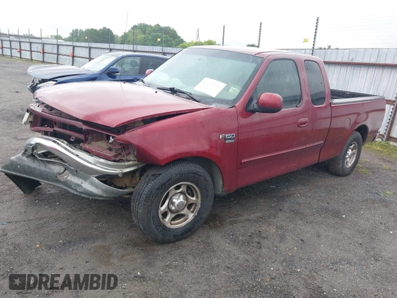 2003 Ford F-150 XL with VIN 1FTRX17W23NA03427, listed as a IAAI auction lot 42335438 with 187,397 mi miles and . Bid and sale history available at DreamBid. Image 2.