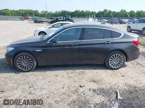 2013 BMW 5 Series GT 535i xDrive with VIN WBASP2C59DC339770, listed as a IAAI auction lot 42171135 with 106,625 mi miles. Bid and sale history available at carsss.com. Image 14.