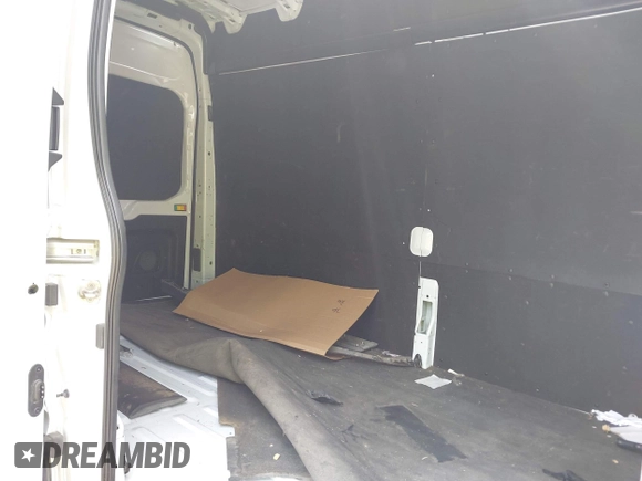 2023 Ford Transit Cargo с VIN 1FTBR1X81PKB01837, выставлен на аукционе IAAI как лот 42489358 с пробегом 68 143 миль миль и . История ставок и продаж доступна на DreamBid. Изображение 8.