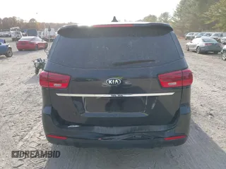 2021 Kia Sedona LX with VIN KNDMB5C1XM6673667, listed as a IAAI auction lot 40759077 with Not Provided miles and . Bid and sale history available at carsss.com. Image 15.