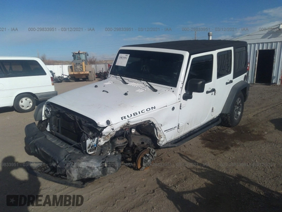 2013 Jeep Wrangler Unlimited Rubicon 10th Anniversary with VIN 1C4HJWFG0DL681417, listed as a IAAI auction lot 29833951 with 118,673 mi miles and . Bid and sale history available at DreamBid. Image 2.