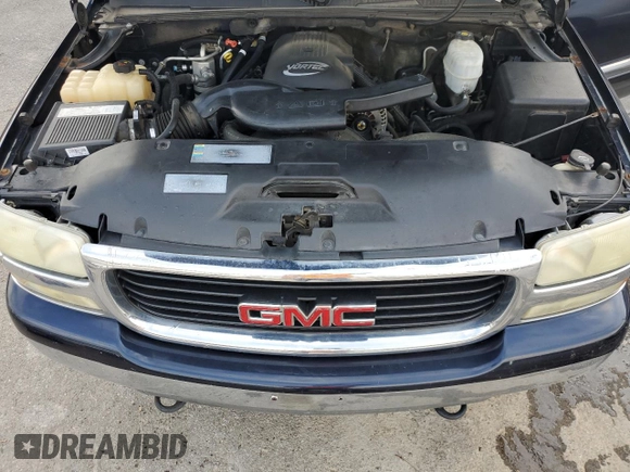 2004 GMC Yukon SLT z VIN 1GKEC13ZX4R203707, wystawiony jako Copart lot #56866075 z przebiegiem Nie podano mil oraz Szkoda całkowita • Salvage title. Historia ofert i sprzedaży dostępna na DreamBid. Obrazek 12.