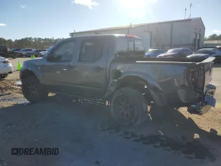 2017 Nissan Frontier Pro-4X with VIN 1N6DD0EV8HN766550, listed as a Copart auction lot 82722834 with 129,909 mi miles and Salvage title. Bid and sale history available at DreamBid. Image 2.