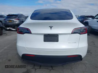 2023 Tesla Model Y Long Range with VIN 7SAYGDEE9PA094191, listed as a IAAI auction lot 41906319 with 15,240 mi miles and . Bid and sale history available at DreamBid. Image 17.