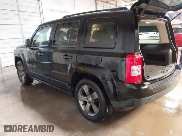 2014 Jeep Patriot High Altitude with VIN 1C4NJPFAXED679271, listed as a IAAI auction lot 41290600 with 157,256 mi miles and . Bid and sale history available at carsss.com. Image 3.