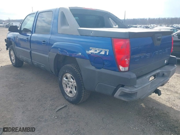 2003 Chevrolet Avalanche with VIN 3GNEK13T23G131174, listed as a IAAI auction lot 41649059 with 230,943 mi miles. Bid and sale history available at carsss.com. Image 3.