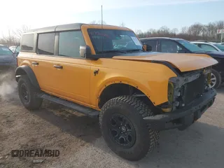 2022 Ford Bronco with VIN 1FMEE5DP8NLB67834, listed as a IAAI auction lot 41772622 with 58,667 mi miles. Bid and sale history available at carsss.com. Image 1.