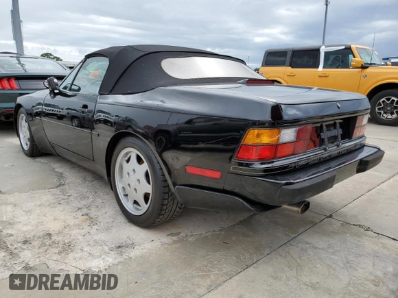 1990 Porsche 944 with VIN WP0CB2946LN480366, listed as a Copart auction lot 74369454 with 78,709 mi miles and Salvage title. Bid and sale history available at DreamBid. Image 2.