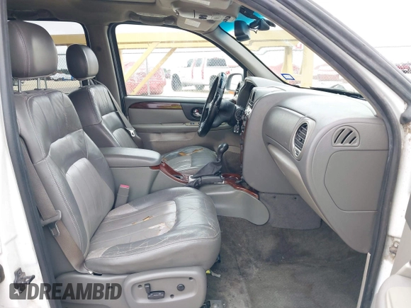 2003 GMC Envoy SLT with VIN 1GKES16S436243654, listed as a IAAI auction lot 42186690 with 125,315 mi miles and . Bid and sale history available at DreamBid. Image 5.