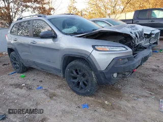 2017 Jeep Cherokee Trailhawk z VIN 1C4PJMBS8HW564408, wystawiony jako IAAI lot #41448501 z przebiegiem 114 399 mil mil oraz . Historia ofert i sprzedaży dostępna na DreamBid. Obrazek 1.