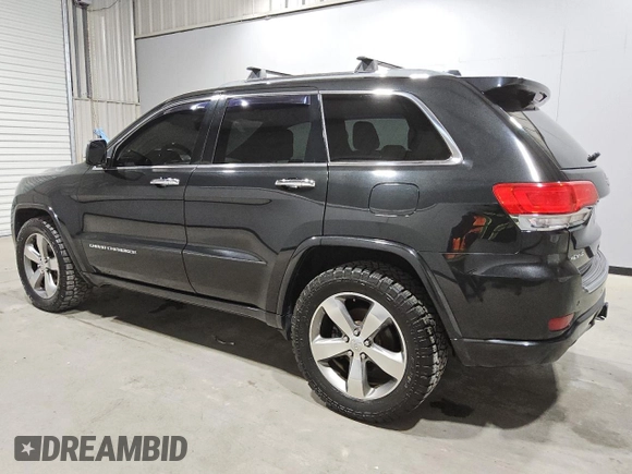 2014 Jeep Grand Cherokee Overland with VIN 1C4RJFCGXEC153250, listed as a Copart auction lot 51327195 with 132,282 mi miles and Clean Title. Bid and sale history available at DreamBid. Image 2.