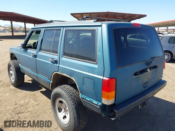 1997 Jeep Cherokee Sport with VIN 1J4FJ68S4VL592390, listed as a IAAI auction lot 41682369 with 194,624 mi miles. Bid and sale history available at carsss.com. Image 3.