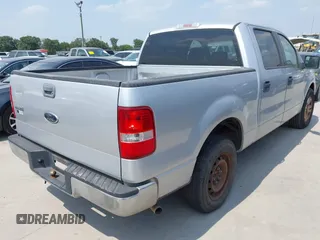 2005 Ford F-150 XLT with VIN 1FTRW12W15FA37754, listed as a IAAI auction lot 42276475 with 218,332 mi miles and . Bid and sale history available at DreamBid. Image 4.