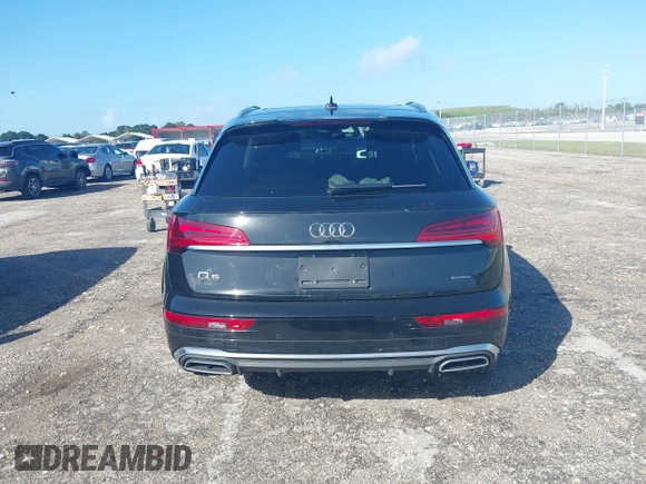 2023 Audi Q5 S line Premium Plus z VIN WA1EAAFY5P2128250, wystawiony jako IAAI lot #40666613 z przebiegiem 27 940 mil mil oraz . Historia ofert i sprzedaży dostępna na DreamBid. Obrazek 17.