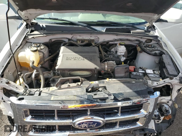 2010 Ford Escape Limited z VIN 1FMCU0EG8AKB93264, wystawiony jako Copart lot #48755805 z przebiegiem 69 141 mil mil oraz Szkoda całkowita • Salvage title. Historia ofert i sprzedaży dostępna na DreamBid. Obrazek 12.