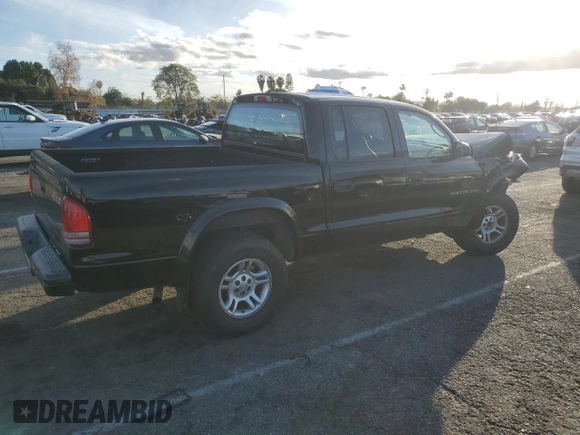 2002 Dodge Dakota Sport with VIN 1B7HG38N82S697439, listed as a Copart auction lot 44282155 with 239,414 mi miles and Salvage Title. Bid and sale history available at carsss.com. Image 3.