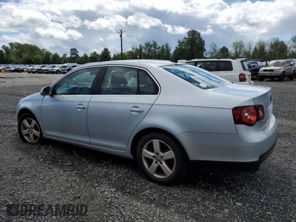 2009 Volkswagen Jetta SE with VIN 3VWRM71K99M156016, listed as a Copart auction lot 57711095 with 206,869 mi miles and Clean title. Bid and sale history available at DreamBid. Image 2.
