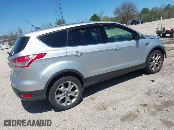 2013 Ford Escape SEL z VIN 1FMCU9H93DUA34811, wystawiony jako IAAI lot #42227559 z przebiegiem 126 495 mil mil oraz . Historia ofert i sprzedaży dostępna na DreamBid. Obrazek 4.