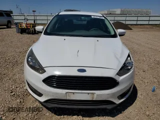2018 Ford Focus SE with VIN 1FADP3FE0JL227146, listed as a Copart auction lot 56151985 with 124,517 mi miles and Salvage title. Bid and sale history available at DreamBid. Image 5.