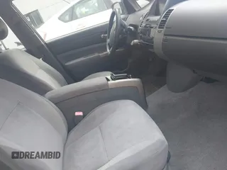 2005 Toyota Prius z VIN JTDKB20U257051452, wystawiony jako IAAI lot #42451660 z przebiegiem 166 106 mil mil oraz . Historia ofert i sprzedaży dostępna na DreamBid. Obrazek 5.