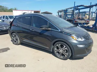 2018 Chevrolet Bolt EV Premier z VIN 1G1FX6S04J4116505, wystawiony jako IAAI lot #42258808 z przebiegiem 103 089 mil mil oraz . Historia ofert i sprzedaży dostępna na DreamBid. Obrazek 1.