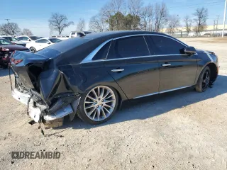 2014 Cadillac XTS Platinum z VIN 2G61W5S8XE9139247, wystawiony jako Copart lot #87930575 z przebiegiem 184 384 mil mil oraz Szkoda całkowita • Salvage title. Historia ofert i sprzedaży dostępna na DreamBid. Obrazek 3.