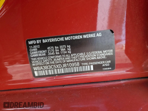 2013 BMW 3 Series 328i xDrive with VIN WBA3B3C5XDJ810958, listed as a Copart auction lot 60620005 with 143,589 mi miles and Salvage title. Bid and sale history available at DreamBid. Image 12.