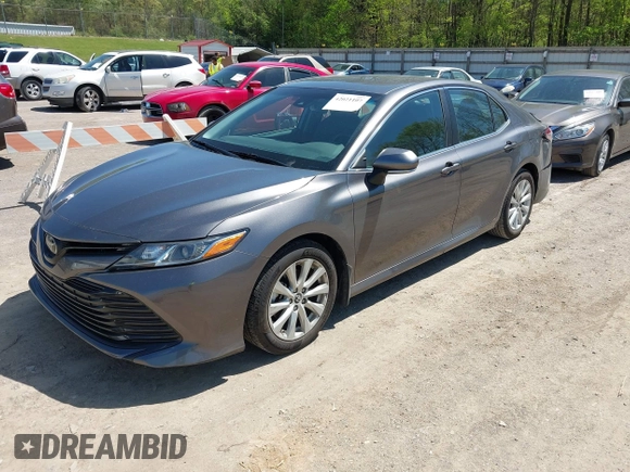 2019 Toyota Camry LE with VIN 4T1B11HK8KU289721, listed as a IAAI auction lot 42021107 with 69,828 mi miles and . Bid and sale history available at DreamBid. Image 2.