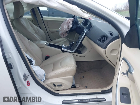 2014 Volvo S60 T5 z VIN YV1612FH8E1292976, wystawiony jako IAAI lot #42129708 z przebiegiem 162 083 mil mil oraz . Historia ofert i sprzedaży dostępna na DreamBid. Obrazek 5.