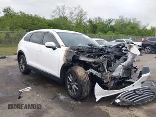 2022 Mazda CX-9 Sport z VIN JM3TCBBYXN0603510, wystawiony jako IAAI lot #42027879 z przebiegiem Nie podano mil oraz . Historia ofert i sprzedaży dostępna na DreamBid. Obrazek 1.