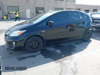 2015 Toyota Prius Four with VIN JTDKN3DU0F1986030, listed as a IAAI auction lot 42034054 with 194,915 mi miles. Bid and sale history available at carsss.com. Image 2.