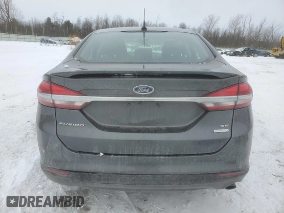 2018 Ford Fusion SE z VIN 3FA6P0HD9JR209998, wystawiony jako Copart lot #43036385 z przebiegiem Nie podano mil oraz Nie do naprawy • Non repairable. Historia ofert i sprzedaży dostępna na DreamBid. Obrazek 6.