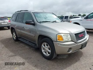 2003 GMC Envoy SLE with VIN 1GKDS13S332290357, listed as a IAAI auction lot 42674201 with 207,939 mi miles and . Bid and sale history available at DreamBid. Image 1.
