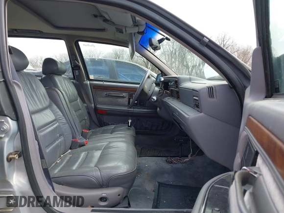 1994 Lincoln Continental with VIN 1LNLM9846RY605390, listed as a IAAI auction lot 41839116 with 100,151 mi miles and . Bid and sale history available at DreamBid. Image 5.