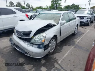 2001 Lexus LS 430 with VIN JTHBN30F110026221, listed as a IAAI auction lot 42022976 with 142,418 mi miles. Bid and sale history available at carsss.com. Image 6.